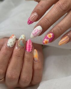 Colorful pink and orange floral nail art at Lilylux Nail Spa London